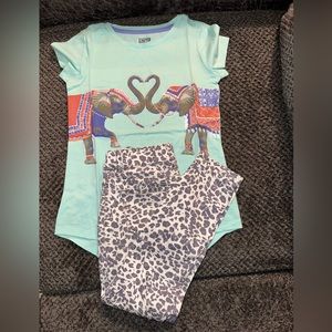 Girl's shirt with pants.